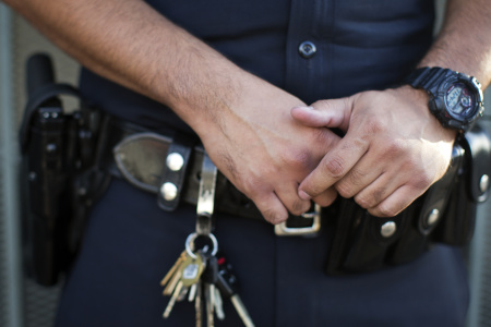 Police Officer, hands crossed