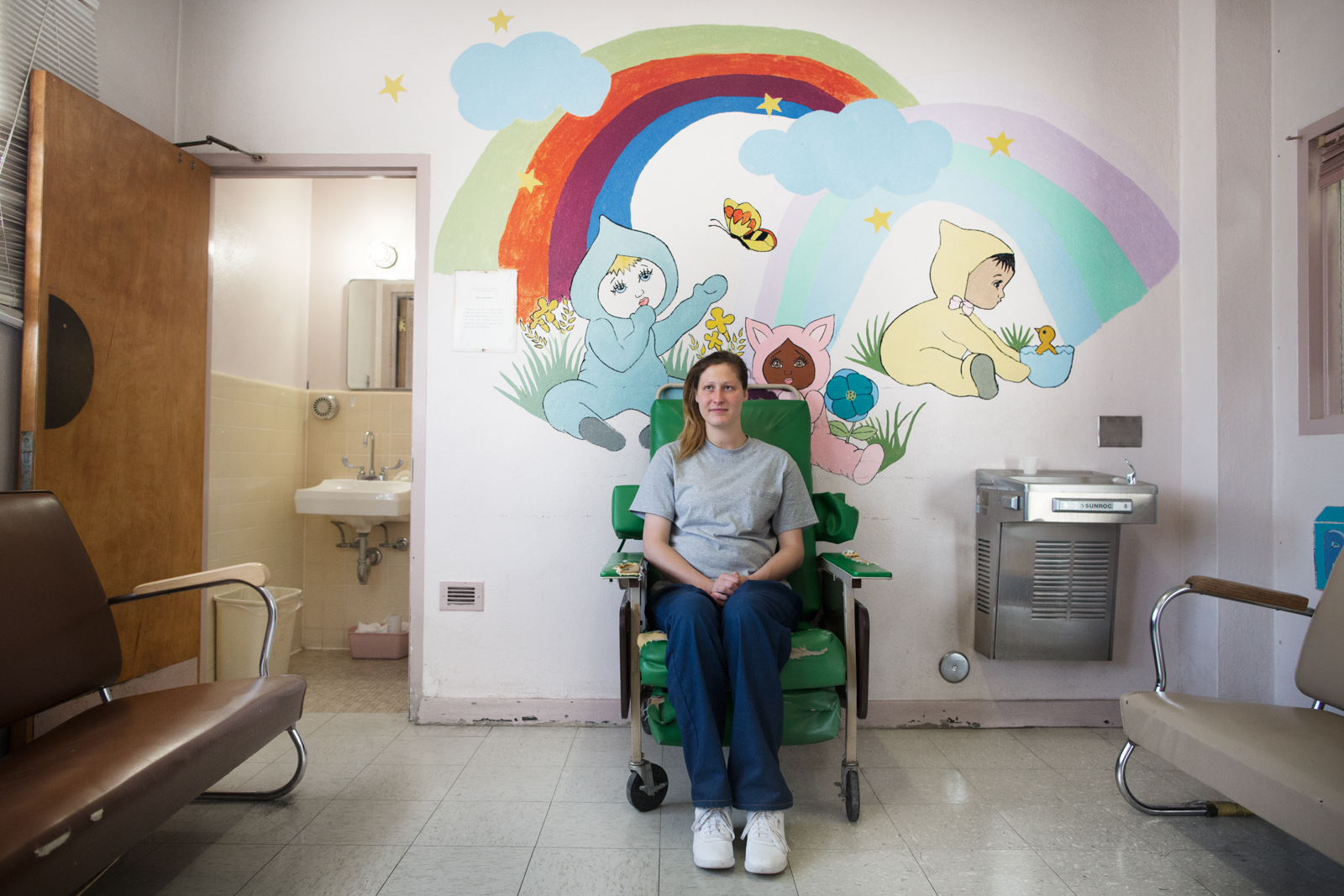 Brittany Bass, 23, sits in the waiting room at the medical ward at the California Institution for Women on May 1, 2013. Twelve days earlier, she had given birth to a daughter, Alexandra Rose, who was adopted by a family who lives in Corona.